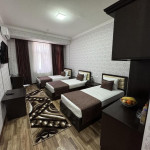 Triple room with shared bathroom