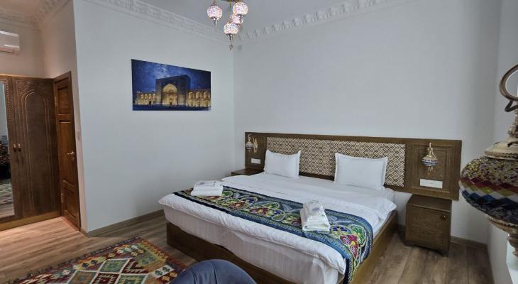 Deluxe Double Room (for 1 adult and 2 children)