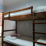 A bed in 4-Bed Mixed Shared Room
