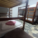 A bed in 4-Bed Mixed Shared Room