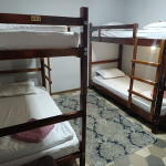 A bed in 4-Bed Mixed Shared Room